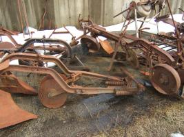 Farmall C mounted plows. 2 complete, plus some spare parts. Call for info.