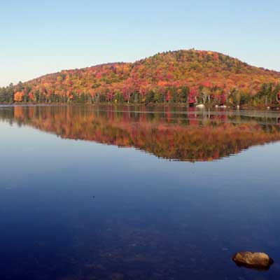 fall color reflected in lake